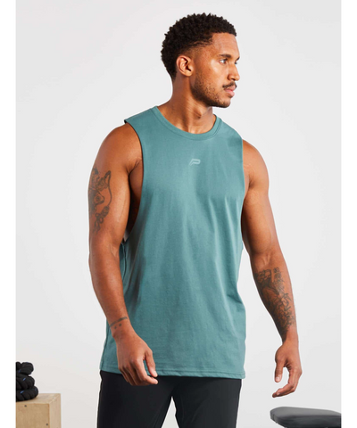 Pursue Fitness Icon Drop Arm Tank Teal